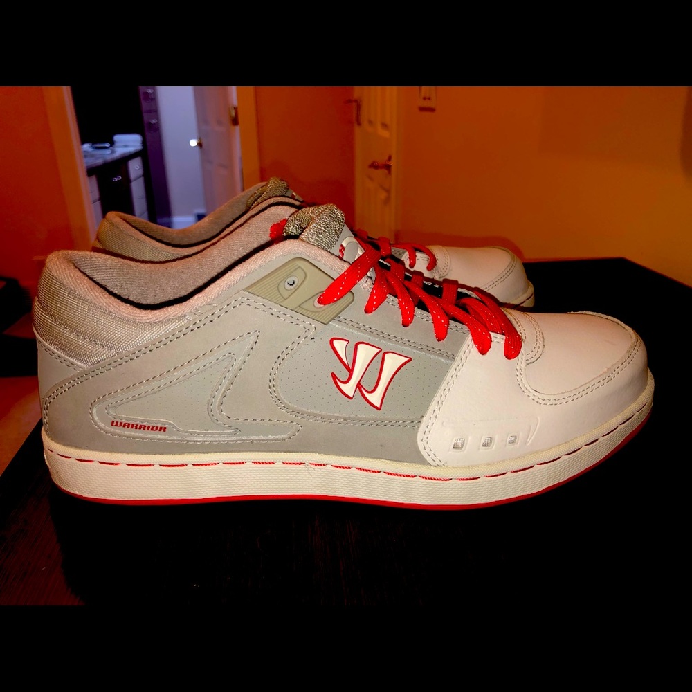 Warrior hockey shoes. Grey and white, with hockey style laces. Size 10.